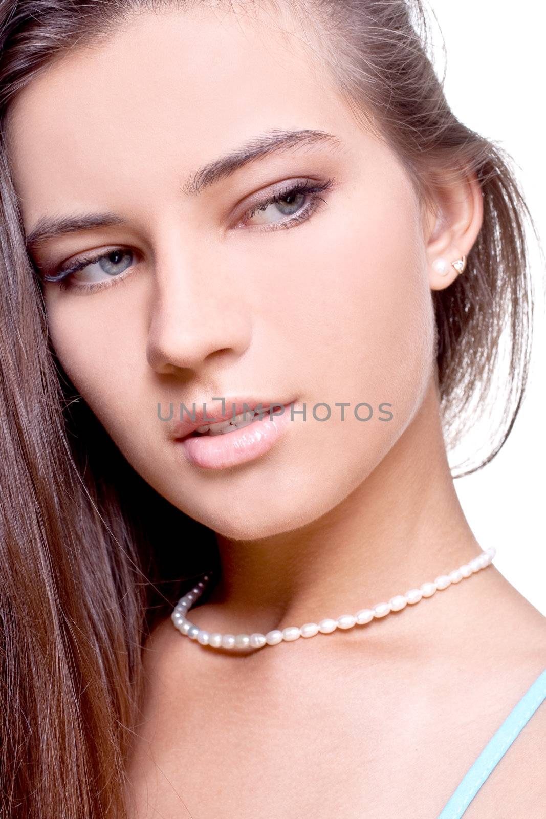 beautiful woman face posing on a white background