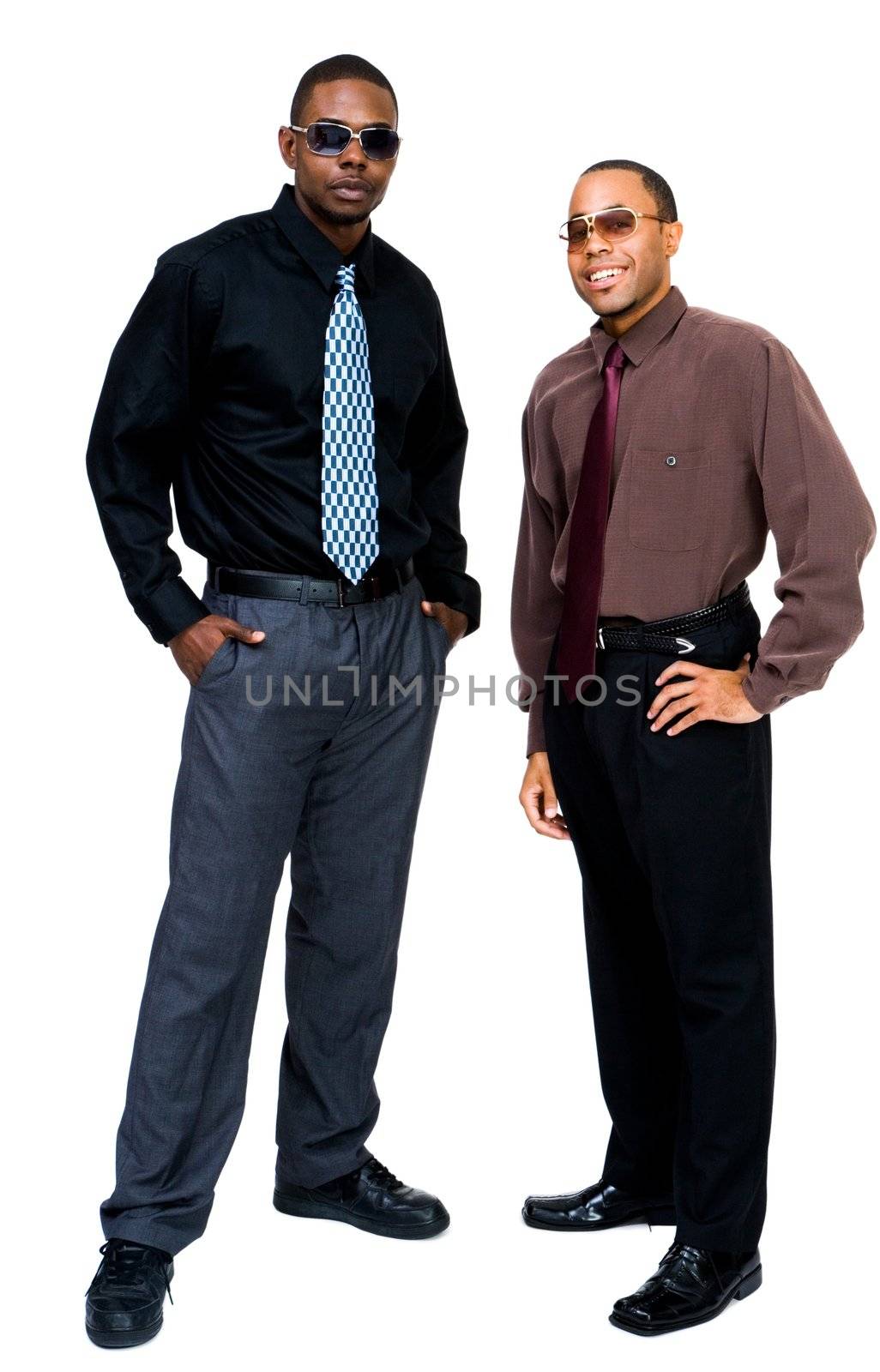 Smiling businessmen posing together isolated over white