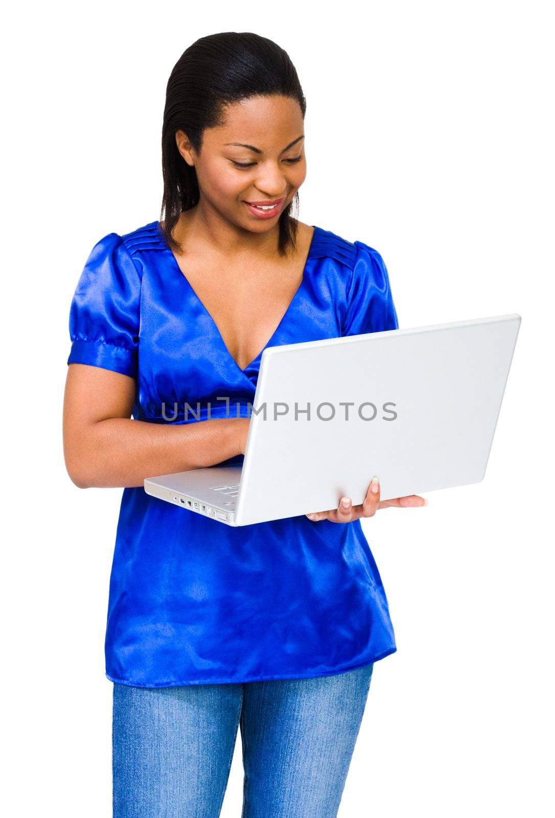 Happy young woman using a laptop isolated over white