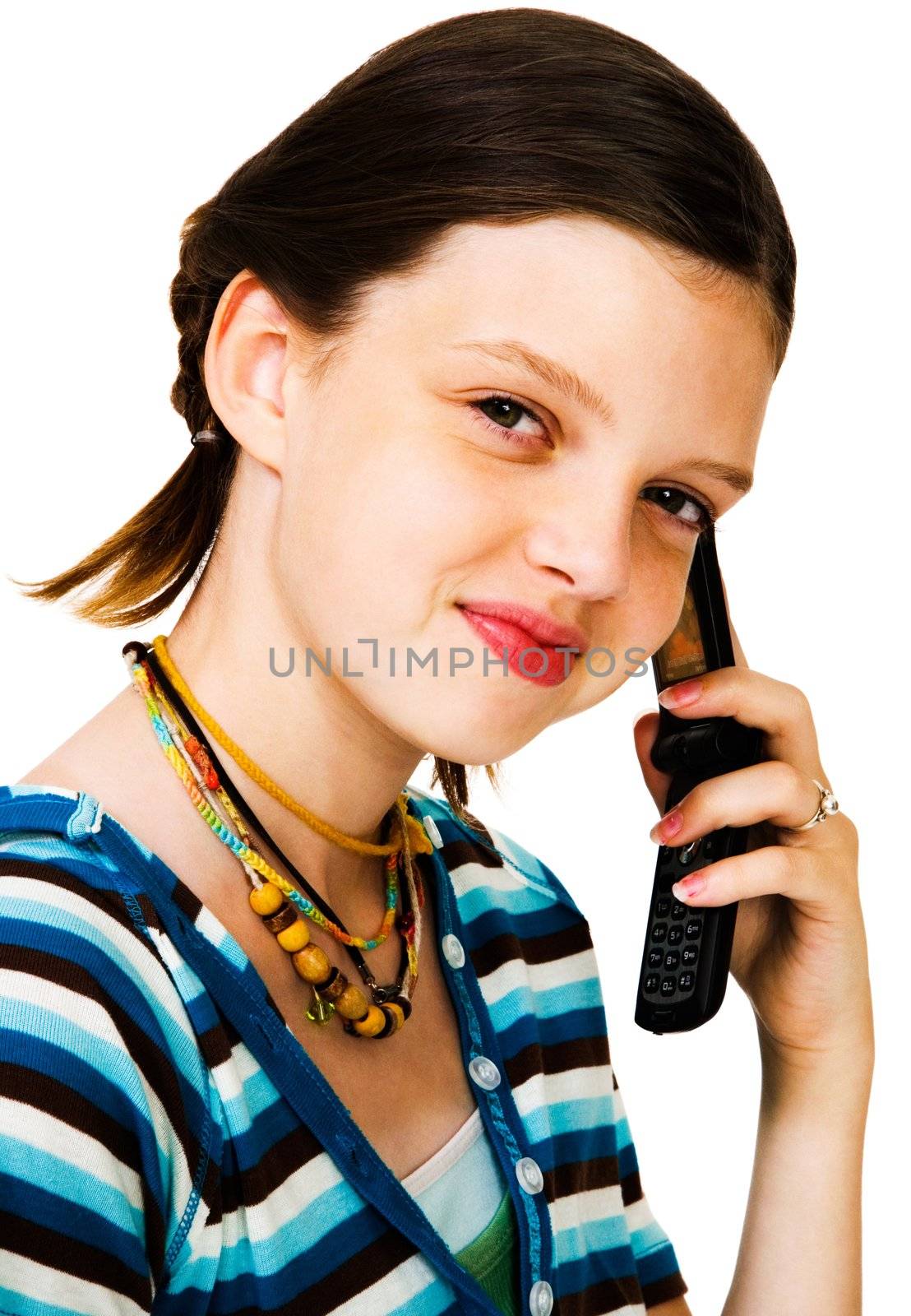 Portrait of a girl talking on a mobile phone isolated over white
