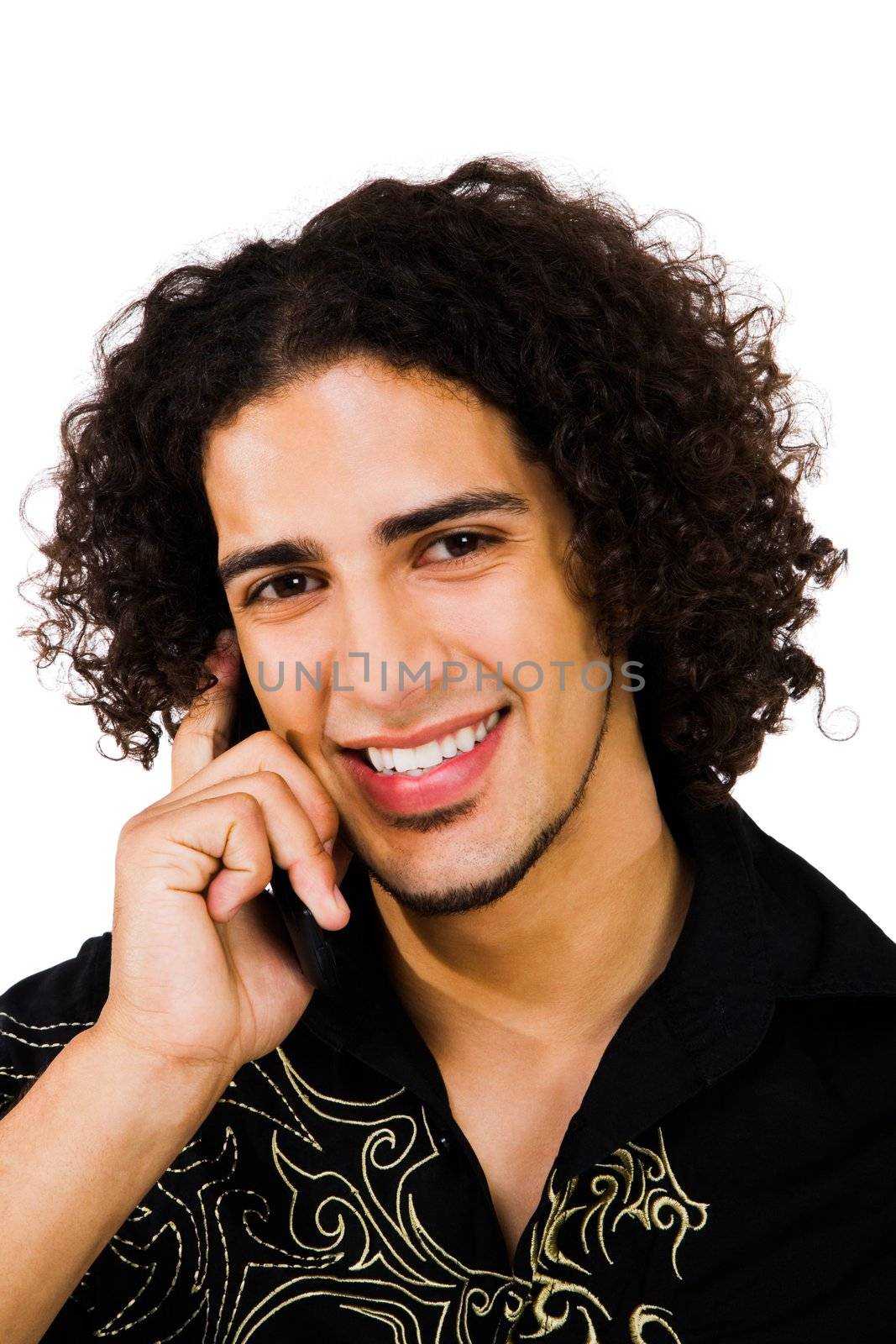 Portrait of a man talking on a mobile phone isolated over white