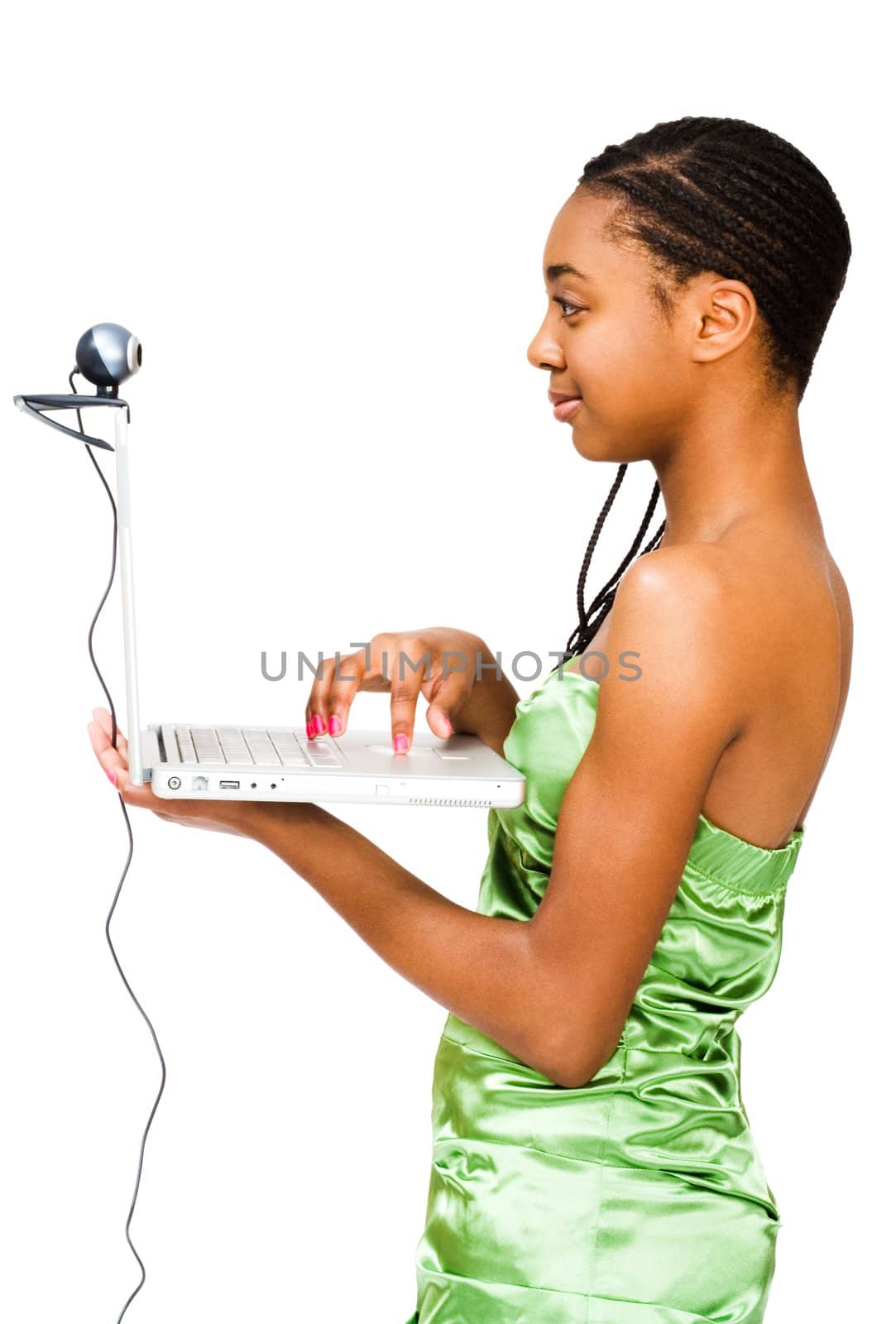 Teenage girl using a laptop  by jackmicro