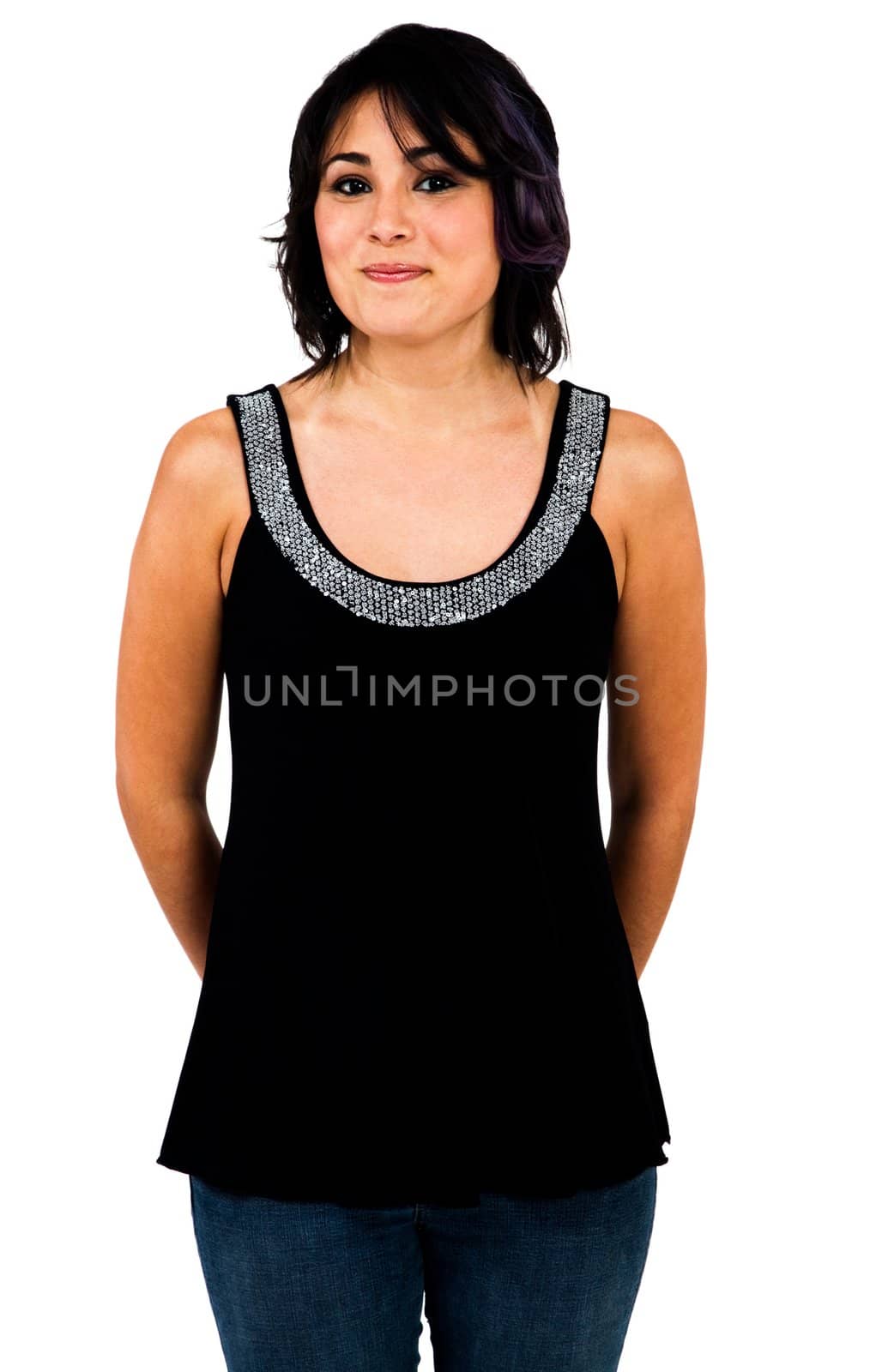 Close-up of a young woman posing and smiling isolated over white