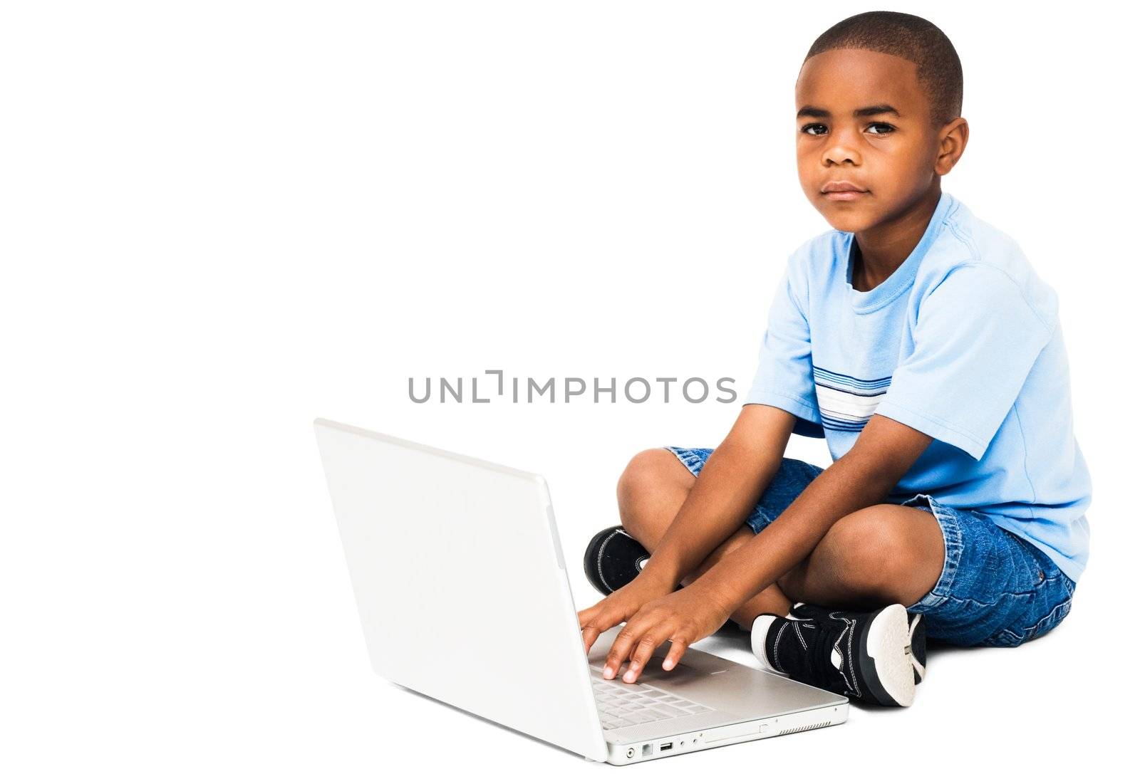 Portrait of boy working on laptop by jackmicro