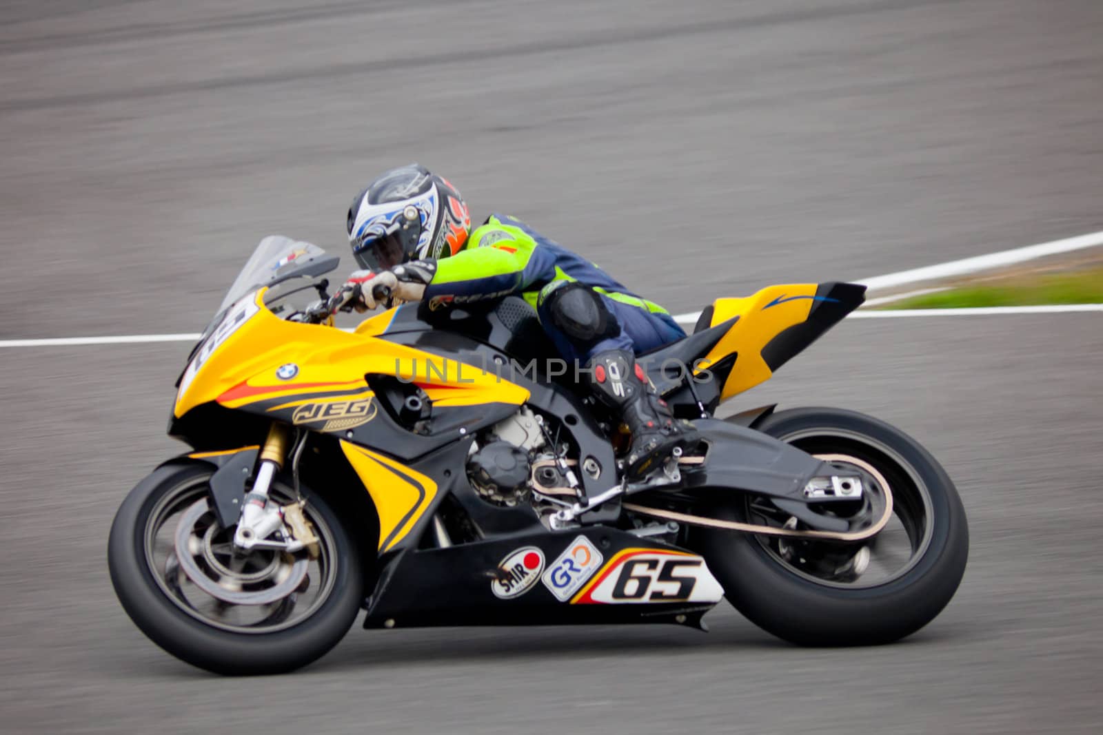JEREZ DE LA FRONTERA, SPAIN - NOV 20: Stock Extreme motorcyclist Juan Gomez takes a curve in the CEV championship on Nov 20, 2010, in Jerez de la Frontera, Spain