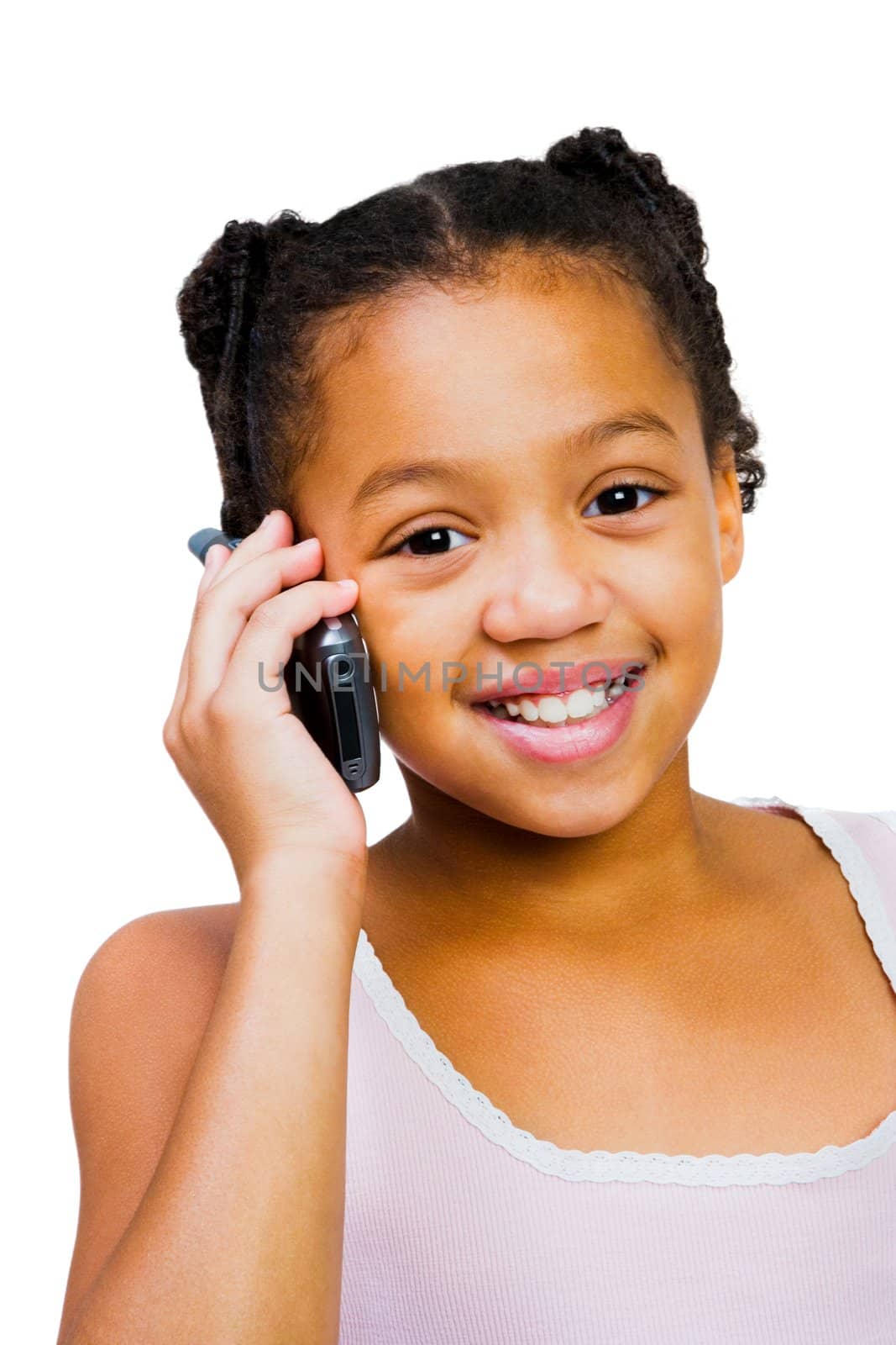 Girl talking on a mobile phone isolated over white