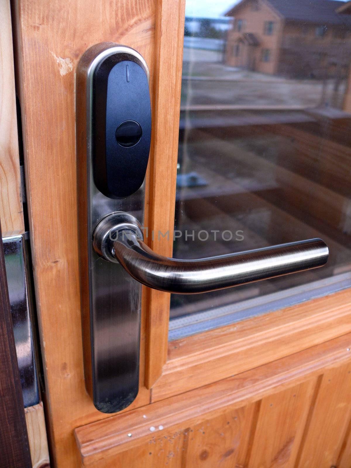 Locked door with keycard identification system by Stoyanov