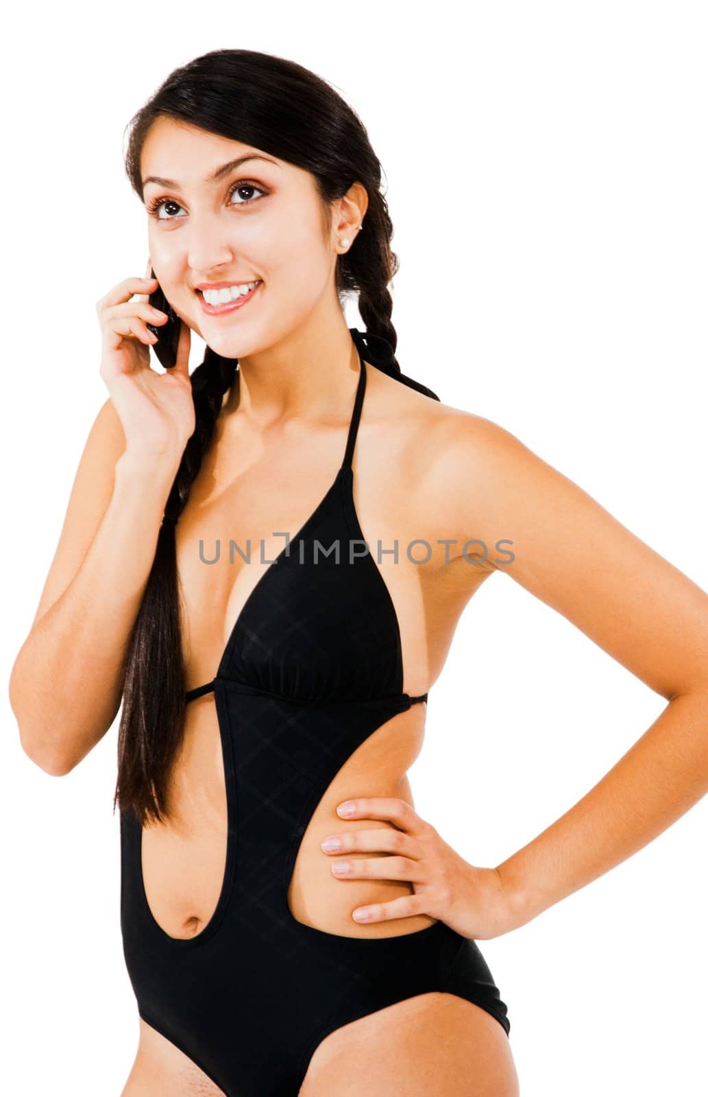 Fashion model talking on a mobile phone isolated over white