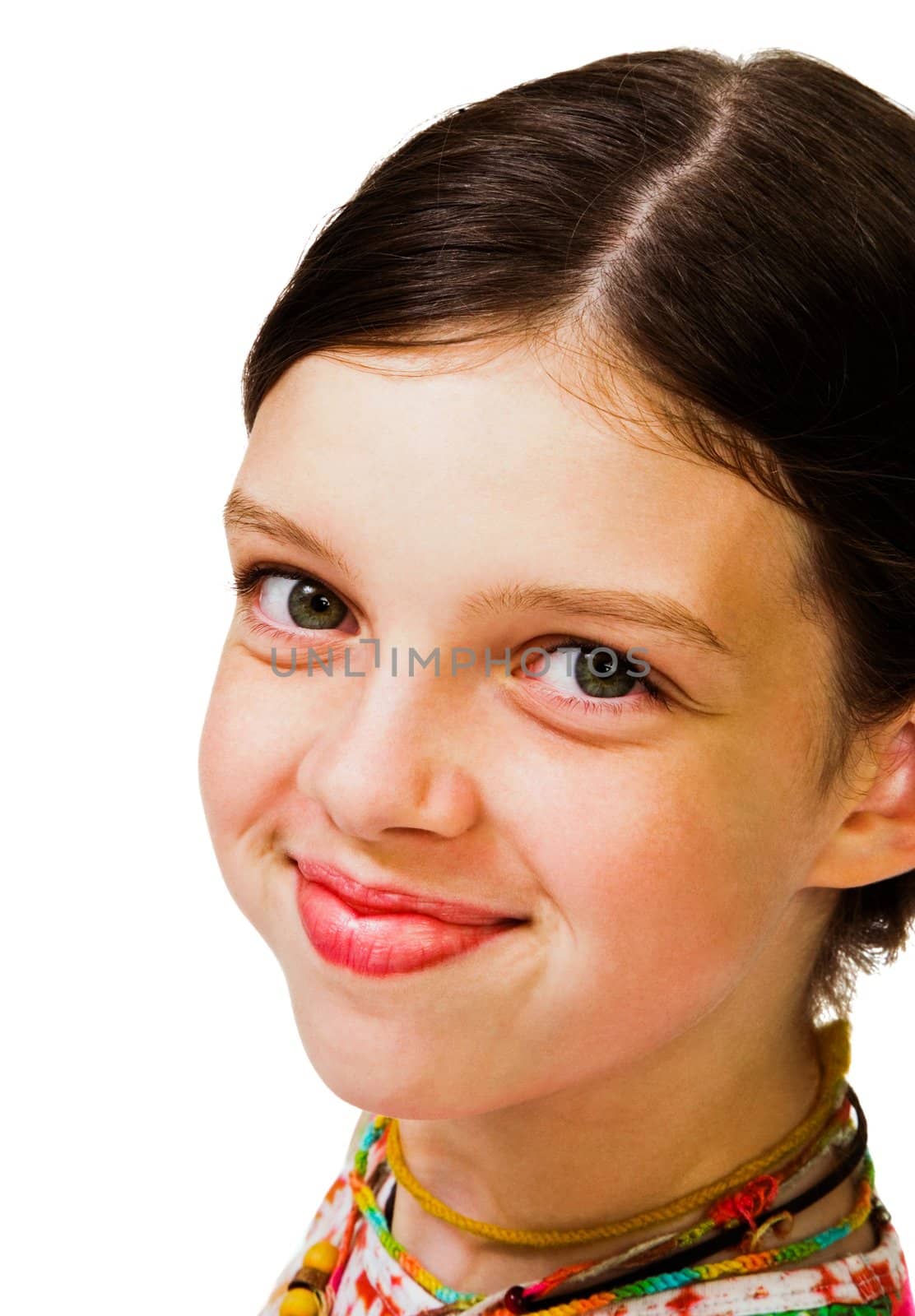 Portrait of a cute girl smiling isolated over white