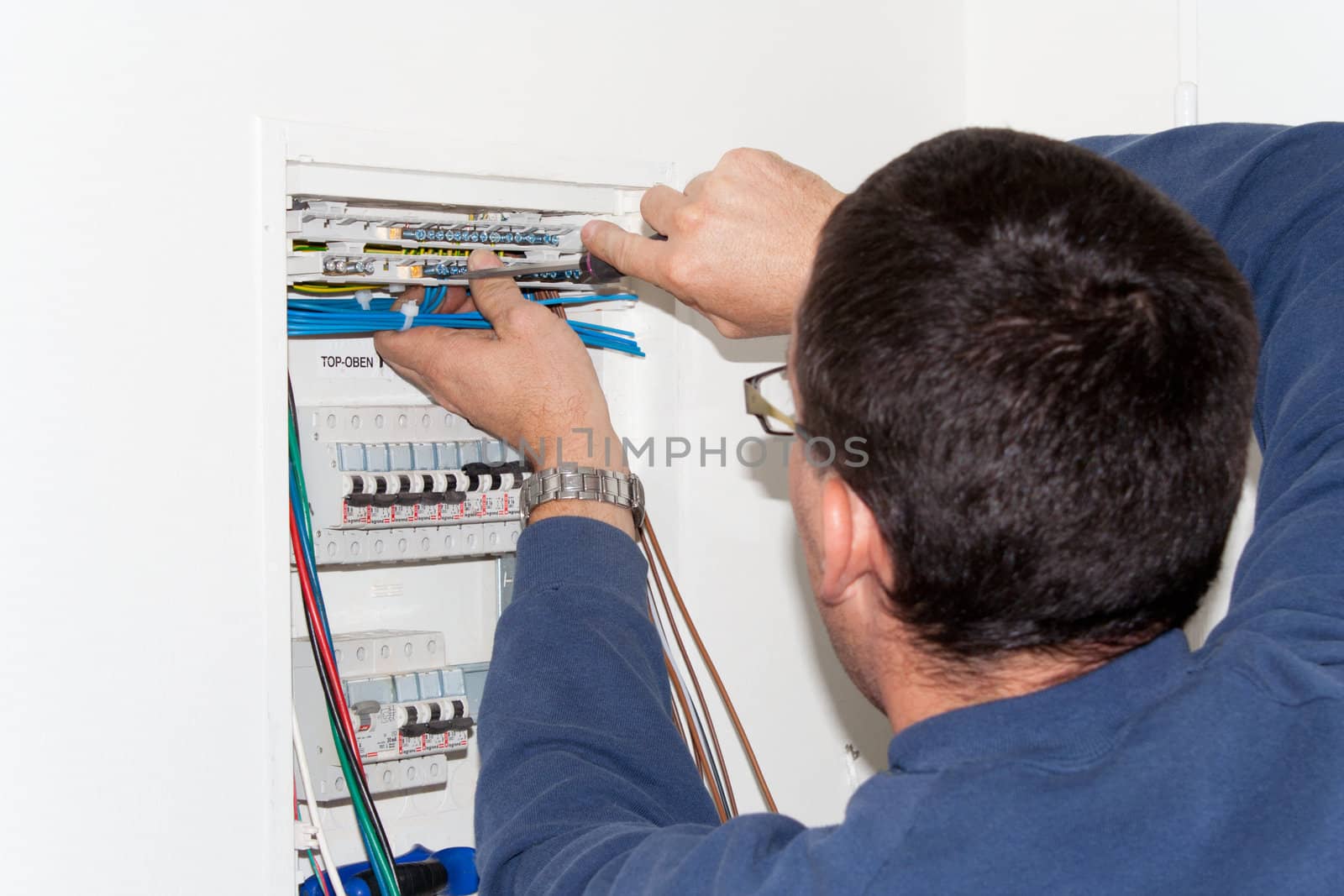 Electrician working on the involvement by LiborF