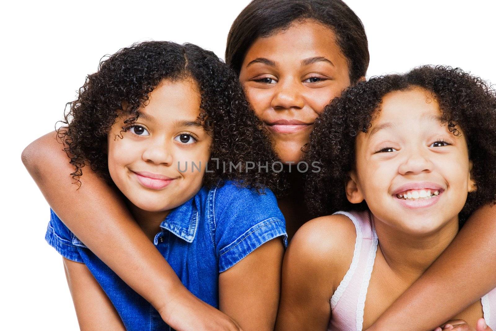 Teenage girl hugging her friends and smiling isolated over white