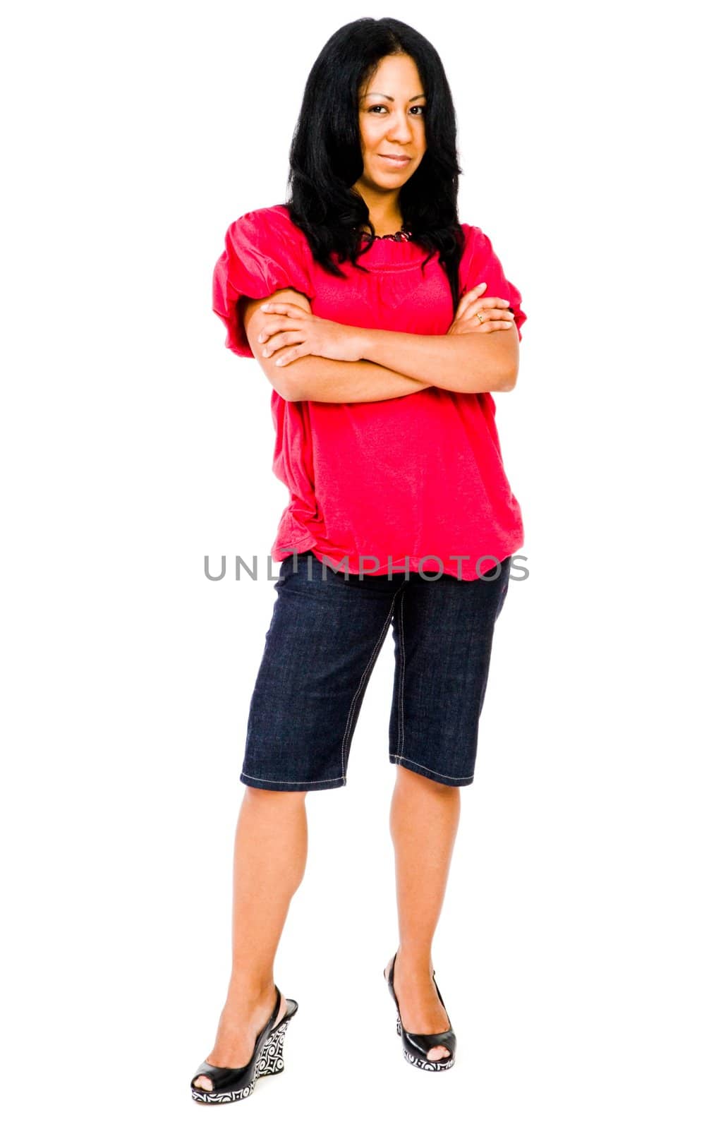 Portrait of a mid adult woman posing and smiling isolated over white