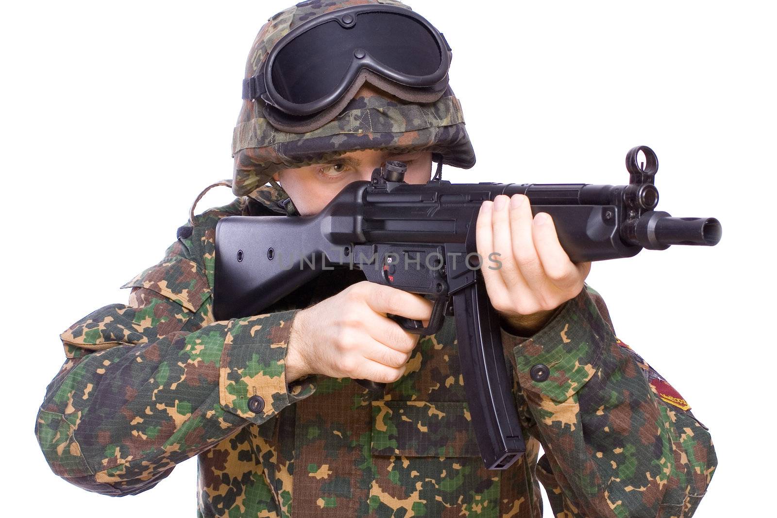 one soldier with the gun in the hands on a white background