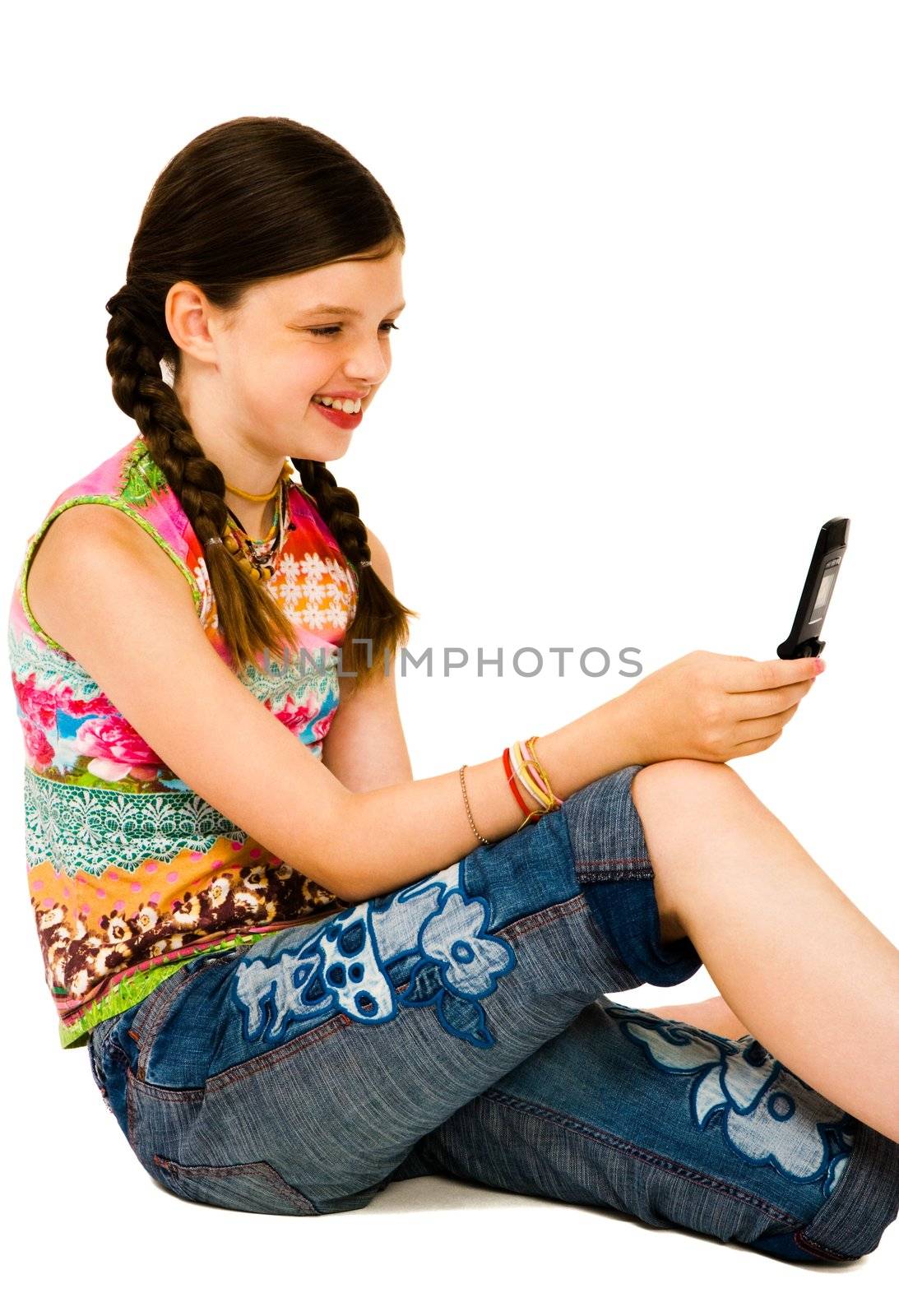 Happy girl text messaging  by jackmicro