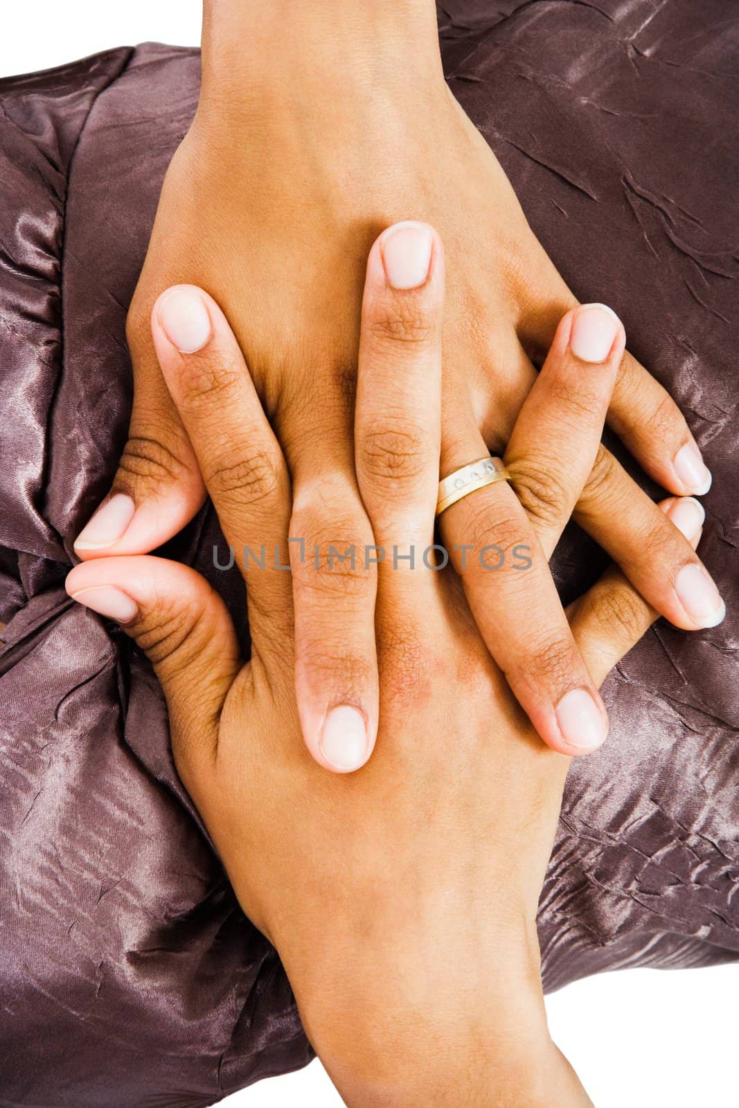 Close-up of a young woman's hand isolated over white