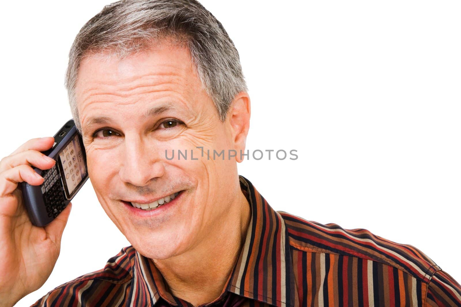 Portrait of a businessman talking on a mobile phone isolated over white