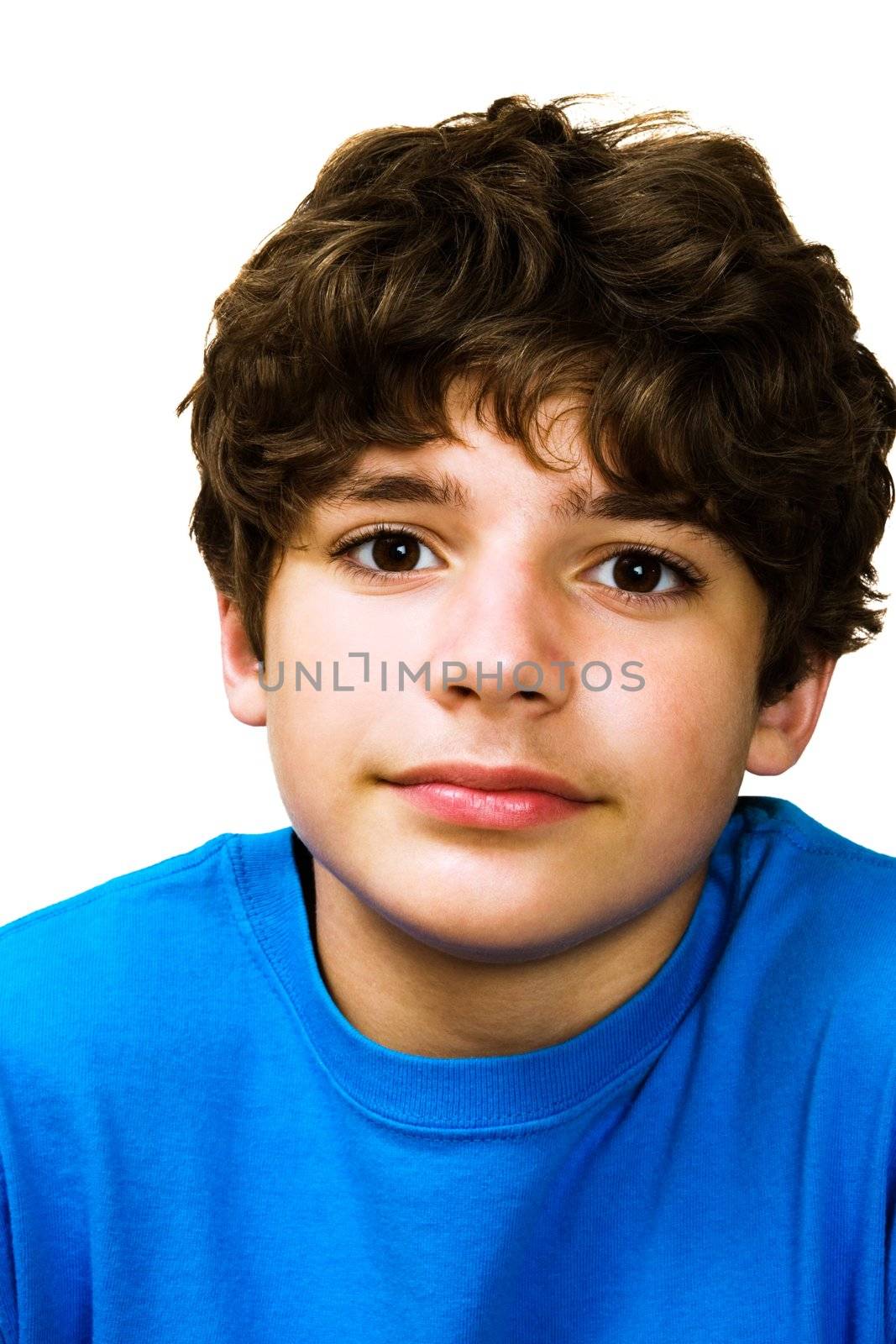 Portrait of a boy posing and smiling isolated over white
