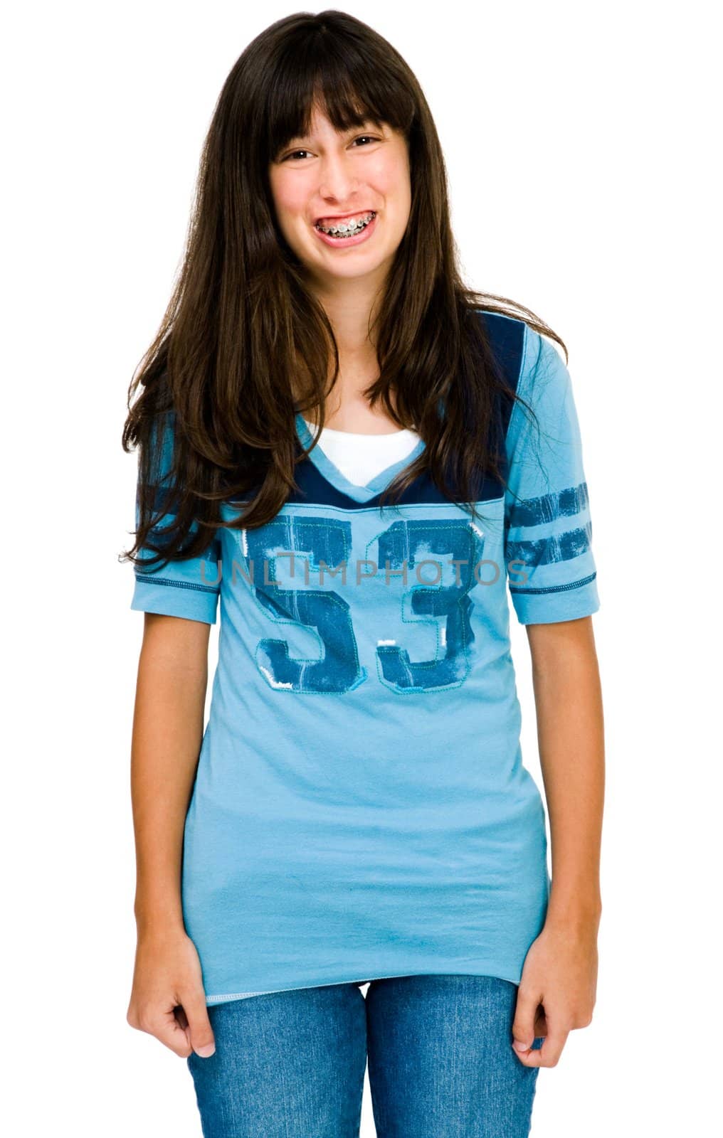 Close-up of a teenage girl posing and smiling isolated over white