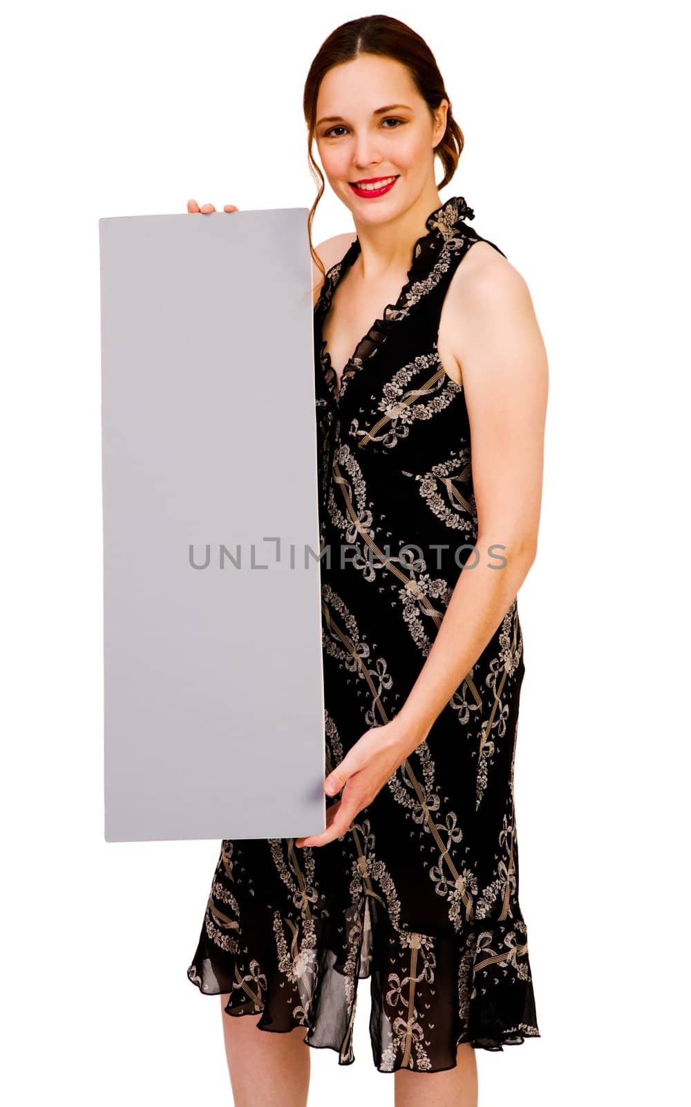 Smiling woman showing an empty placard isolated over white