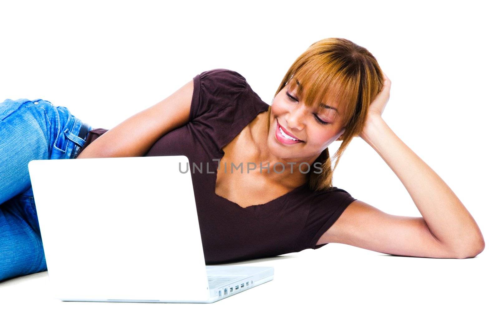 African woman using laptop by jackmicro