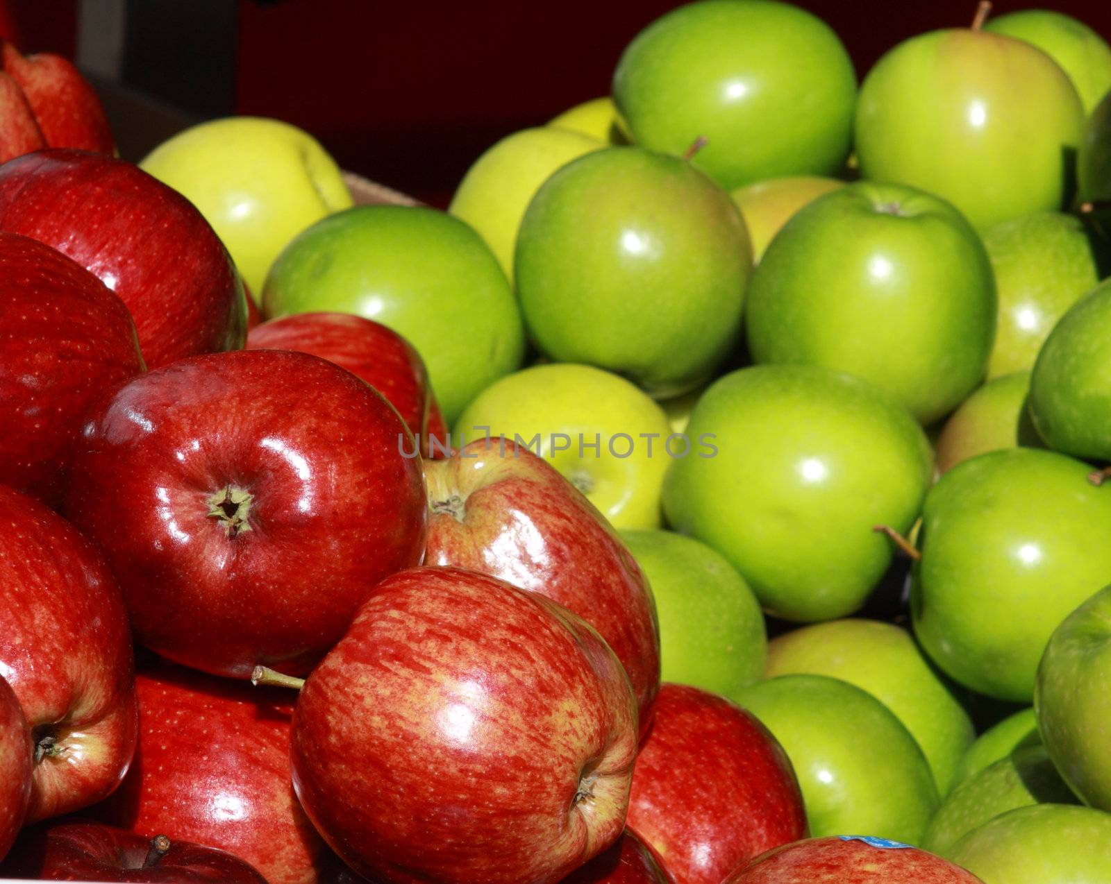 fresh juicy red and green apples on the market