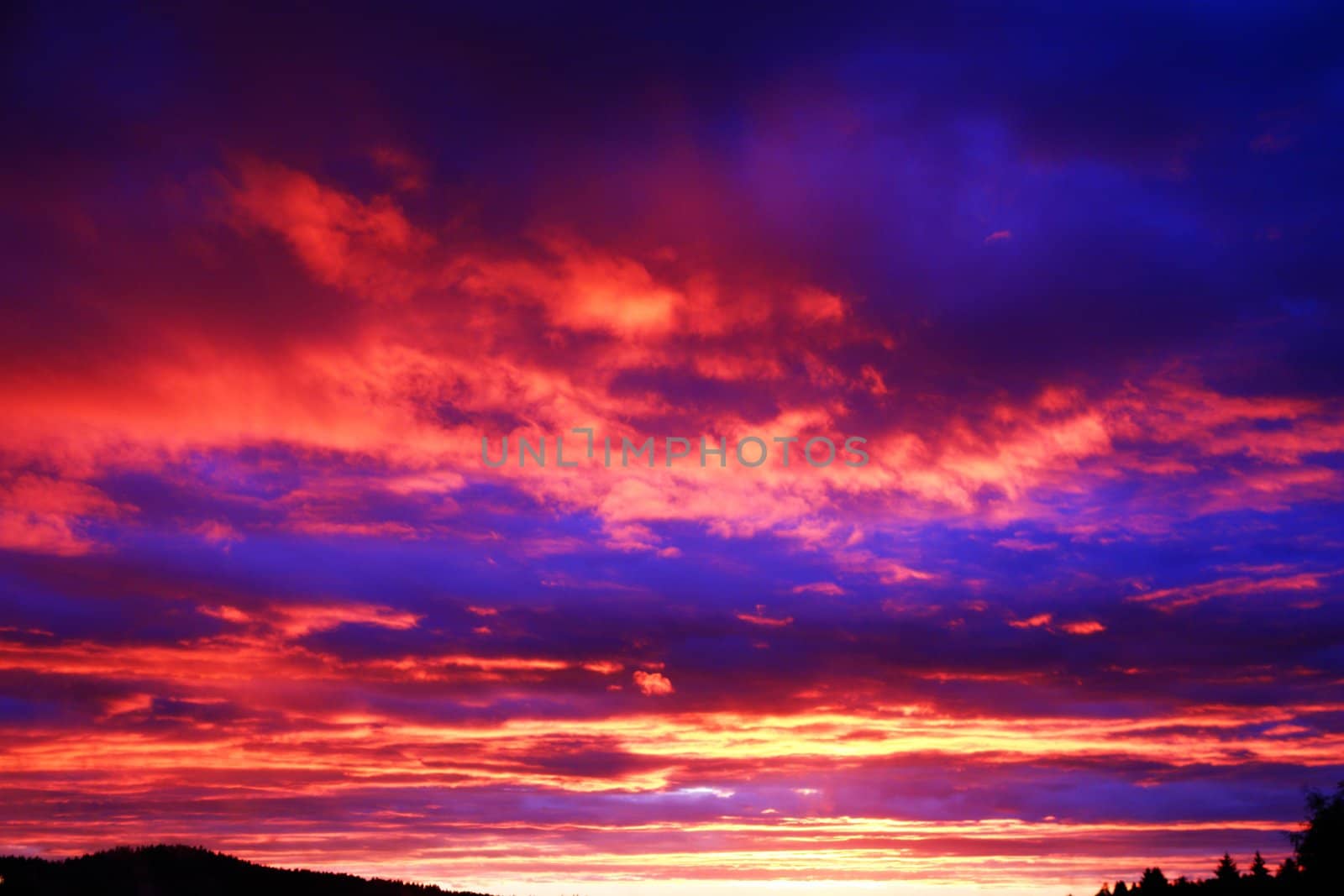 Storm Clouds At Sunset by yucas