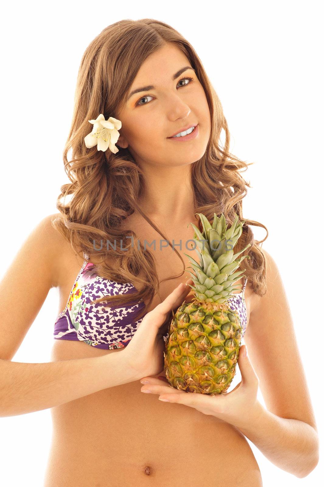 young sexy smiling girl with pine-apple isolated on white and symbolizing summer