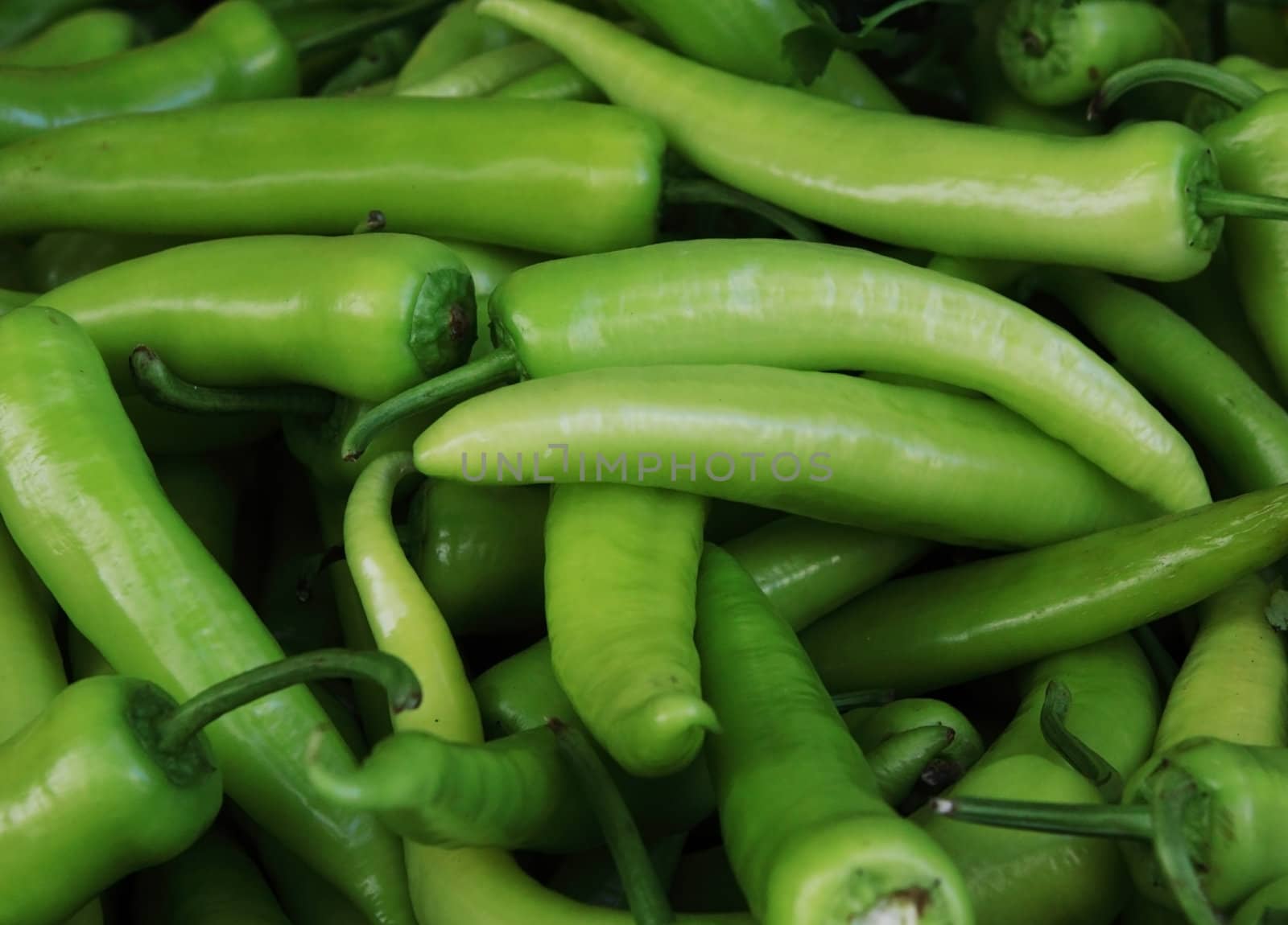 background of fresh green hot chilli pepper