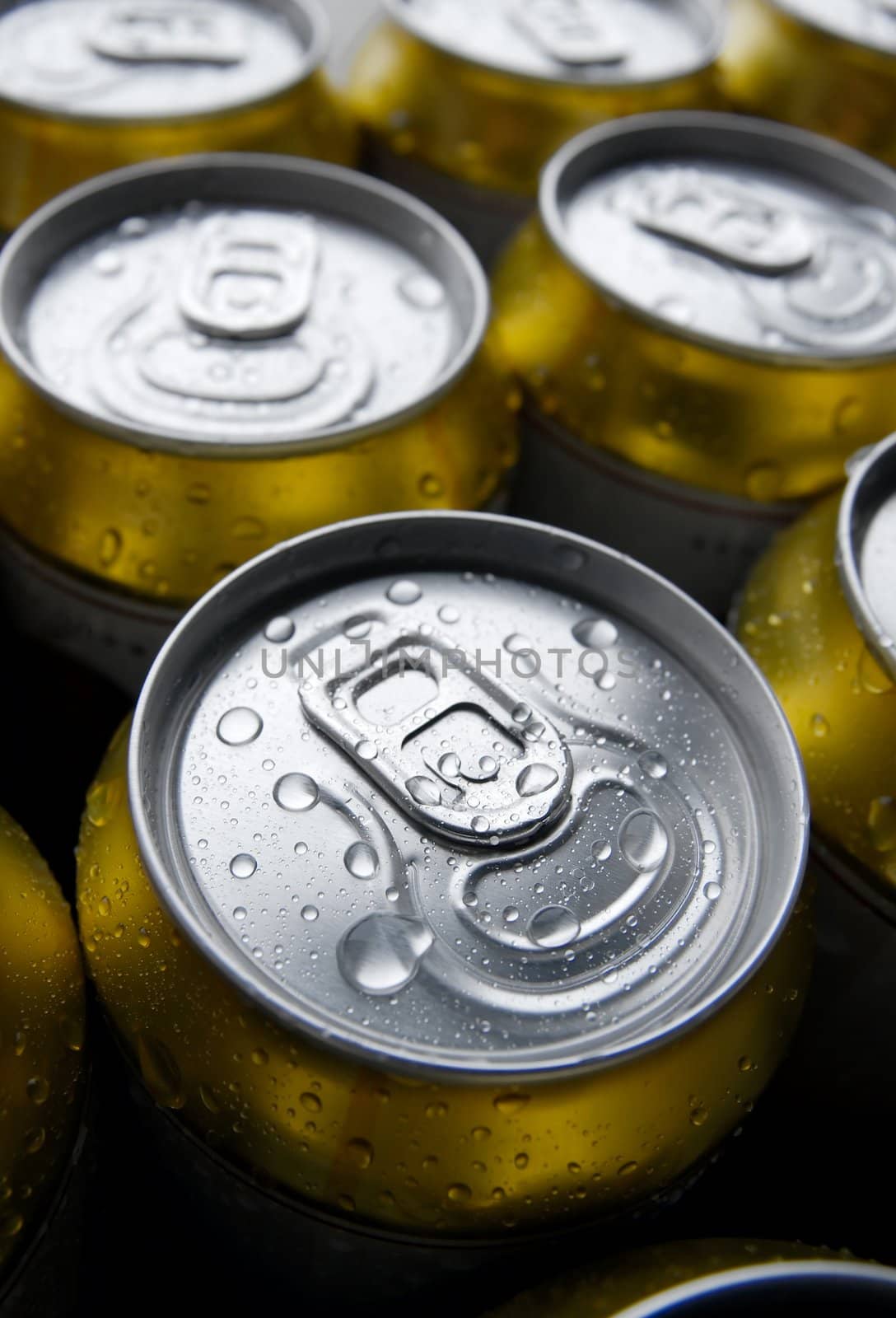 Cans of beer with water drops