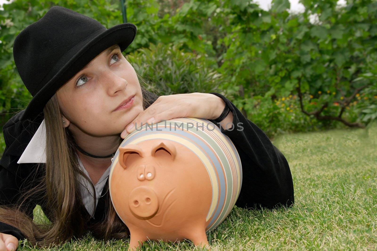 Girl with piggy bank