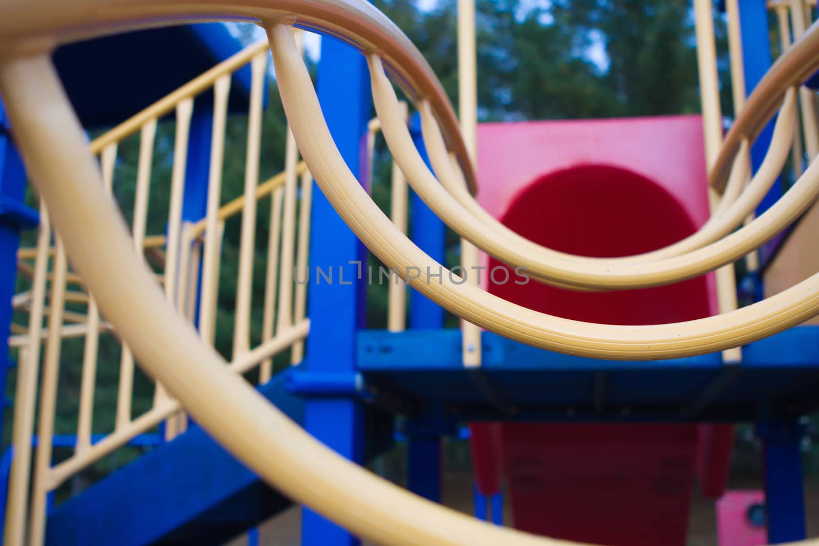 Yellow Climbing ladder at a child's playground.