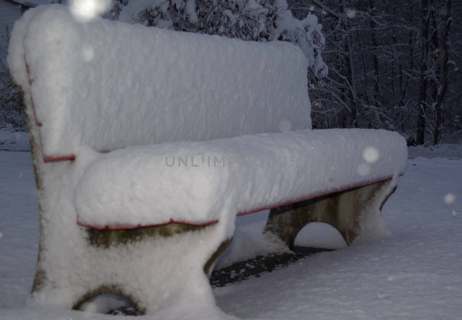 snowy park bench