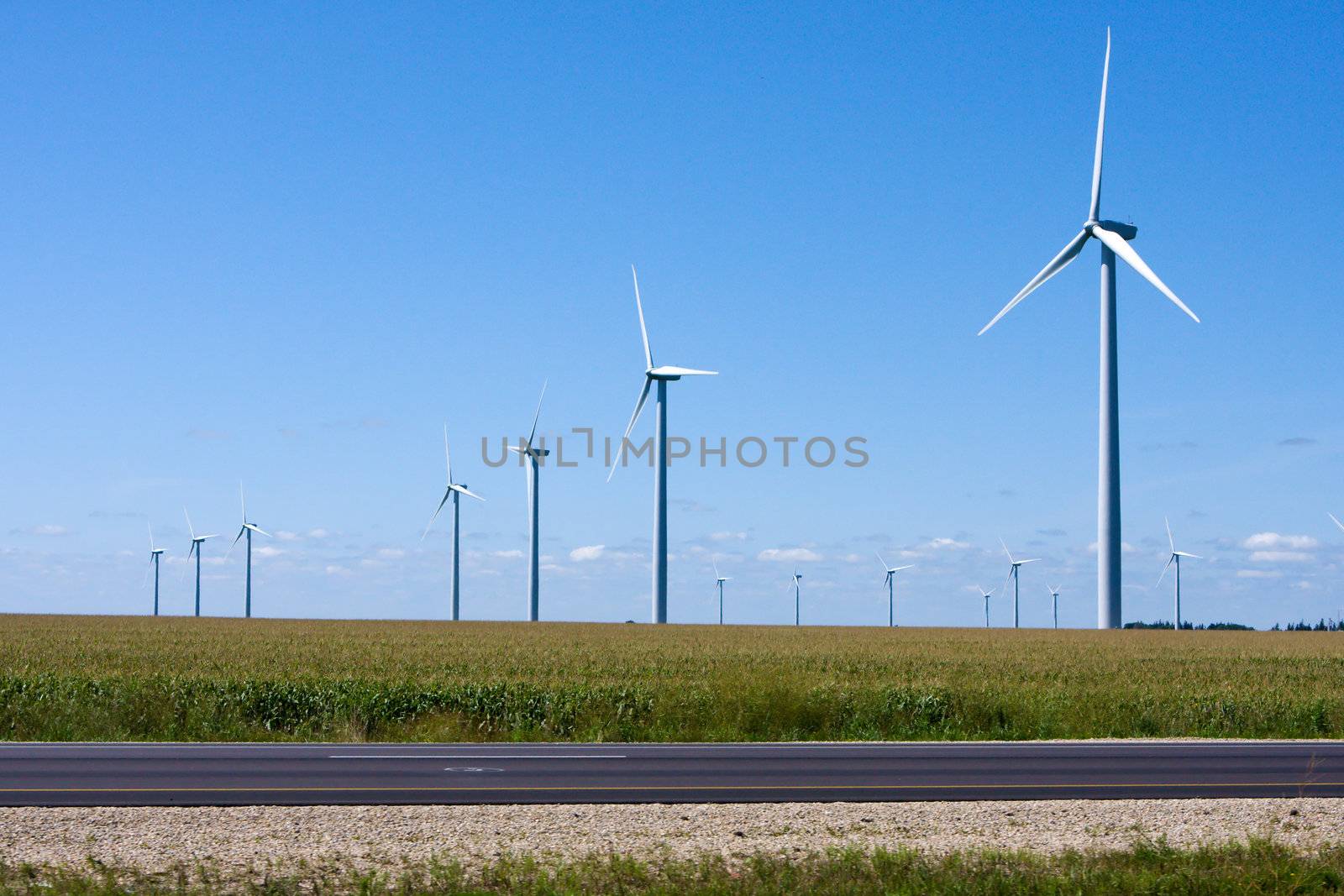 Modern Windmills generating electricity along the Interstate.