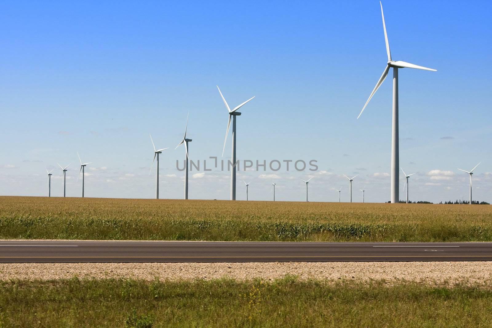 Modern Windmills generating electricity along the Interstate.