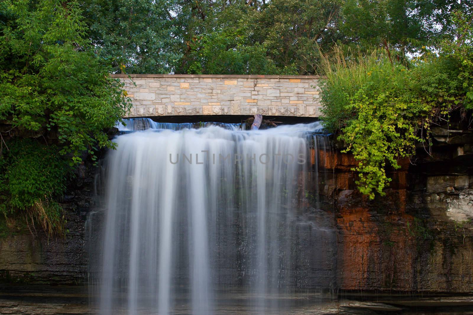 The top of a Minneapolis waterfall and bridge.