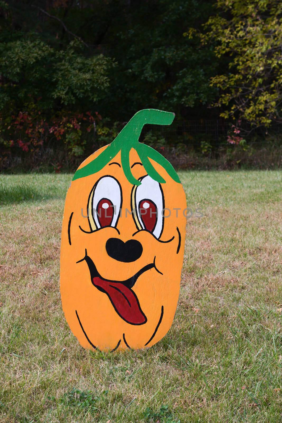 Large Pumpkin Yard Decoration with smiley face.