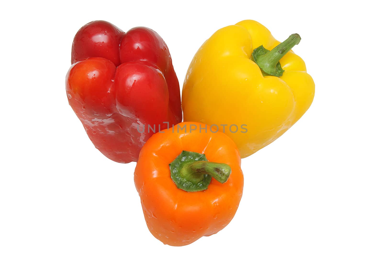 Three peppers of different colors isolated on white background
