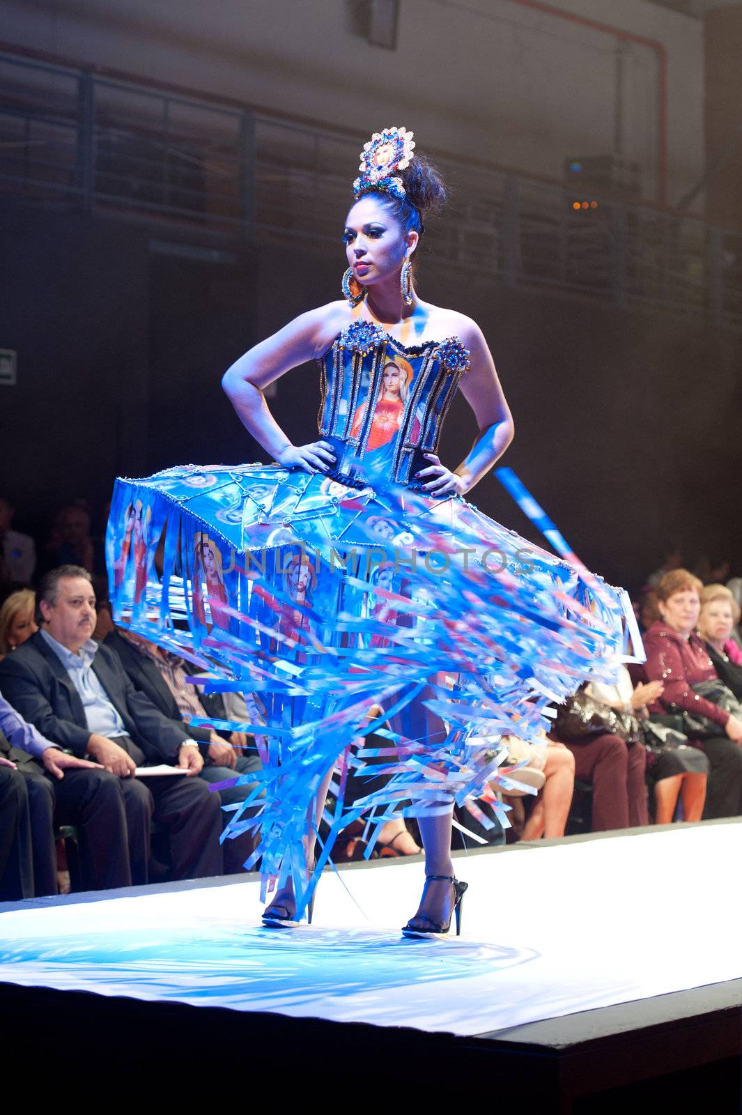 CANARY ISLANDS - 28 OCTOBER: Model on the catwalk wearing carnival costume from designer Julio Vicente Artiles during Carnival Fashion Week October 28, 2011 in Canary Islands, Spain