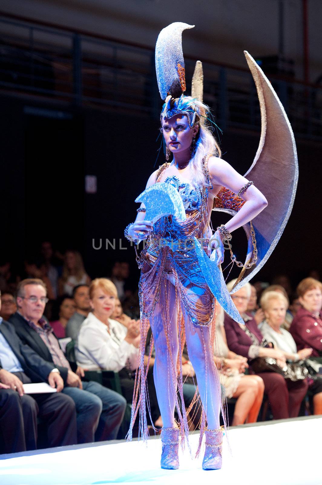 CANARY ISLANDS - 28 OCTOBER: Model on the catwalk wearing carnival costume from designer Rafael Deniz and Rosa Montesdeoca during Carnival Fashion Week October 28, 2011 in Canary Islands, Spain