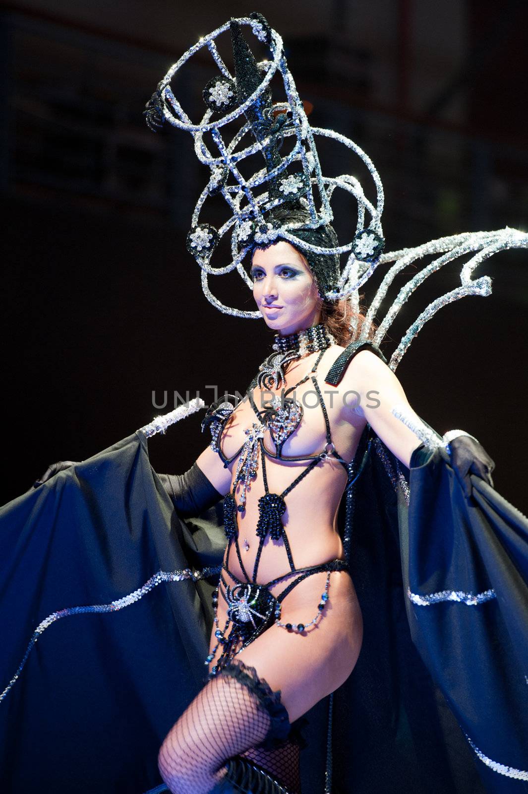 CANARY ISLANDS - 28 OCTOBER: Model on the catwalk wearing carnival costume from designer Willie Diaz during Carnival Fashion Week October 28, 2011 in Canary Islands, Spain