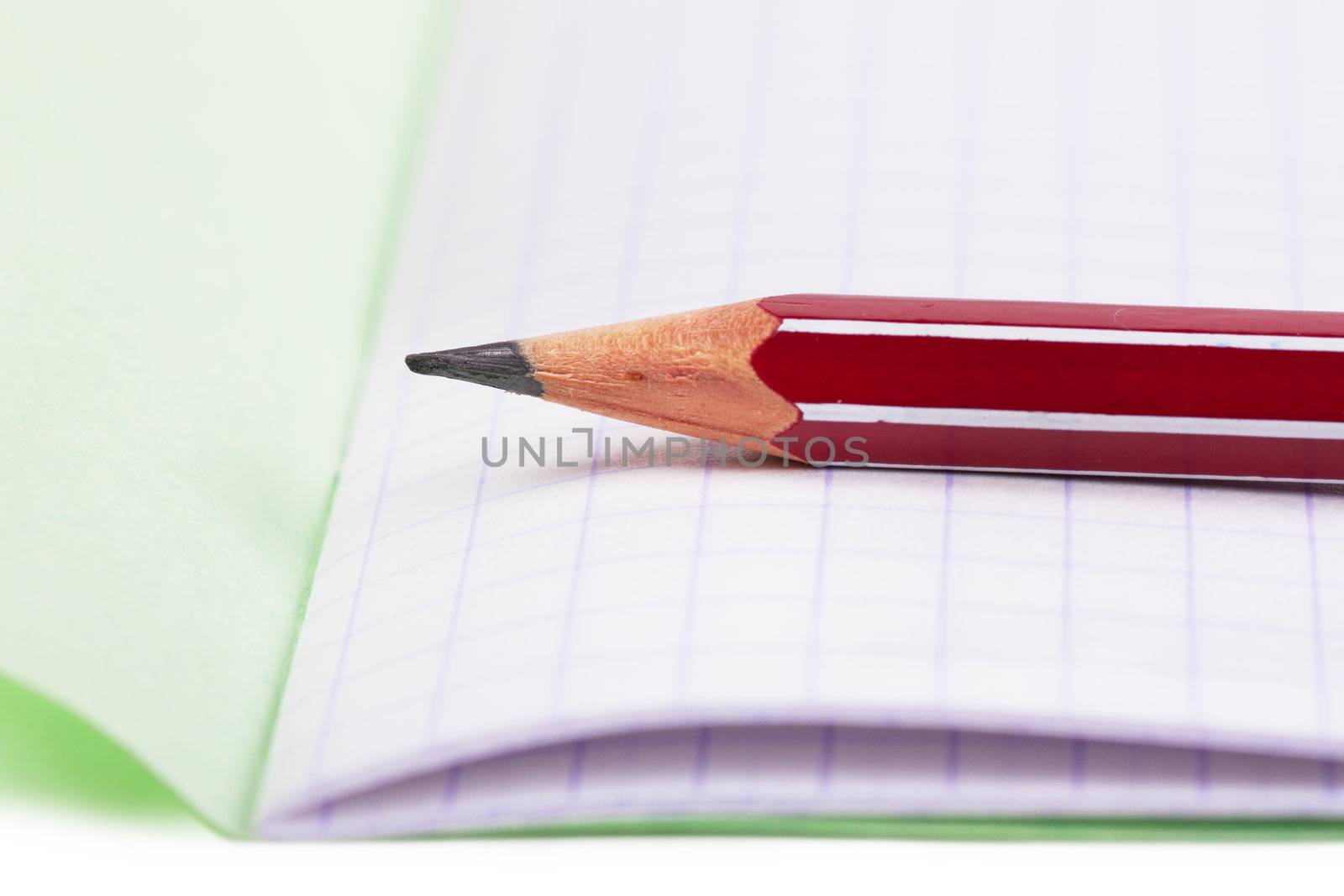 Macro view of pencil on a blank sheet