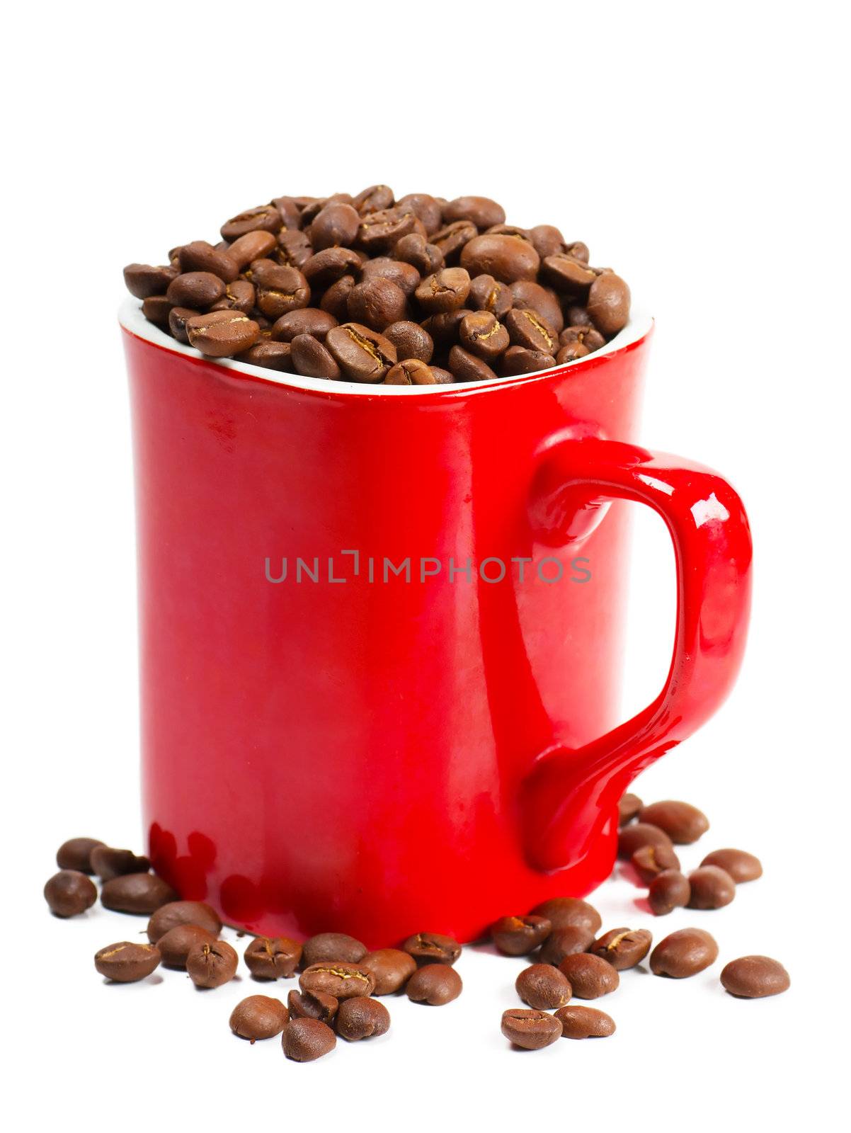 Coffee beans in a red cup isolated over white background.