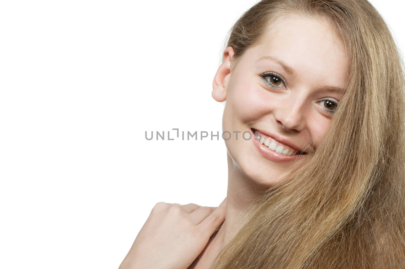 The beautiful girl with long healthy hair. It is isolated on a white background