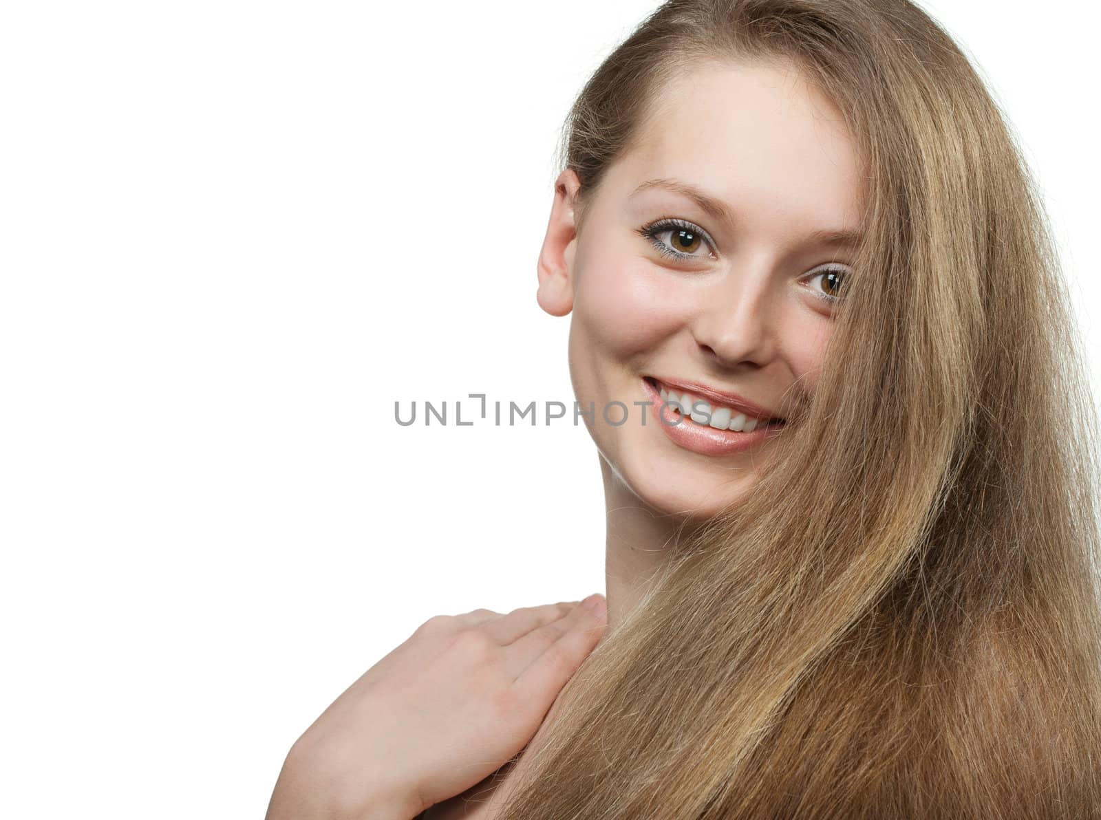 The beautiful girl with long healthy hair. It is isolated on a white background