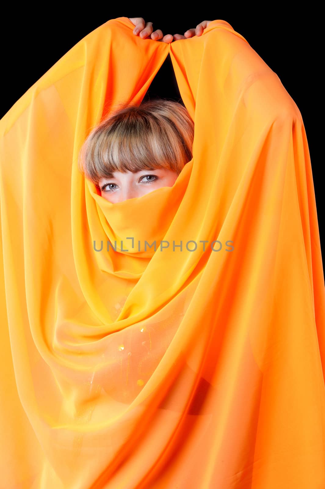 The woman close up. Face partially covered pareo.
