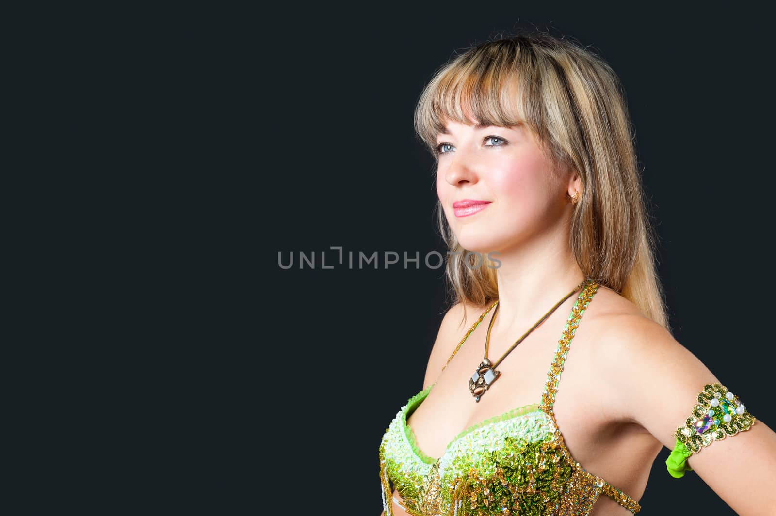 The attractive woman in underwear. Isolated on black background