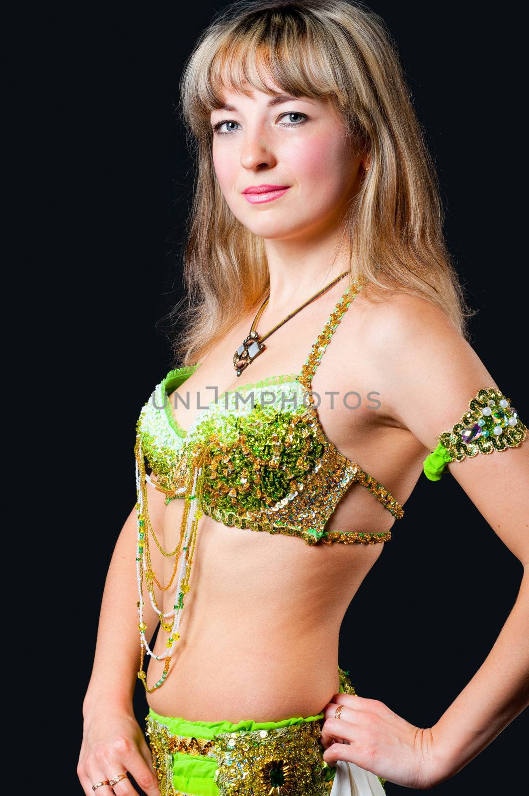 The attractive woman in underwear. Isolated on black background