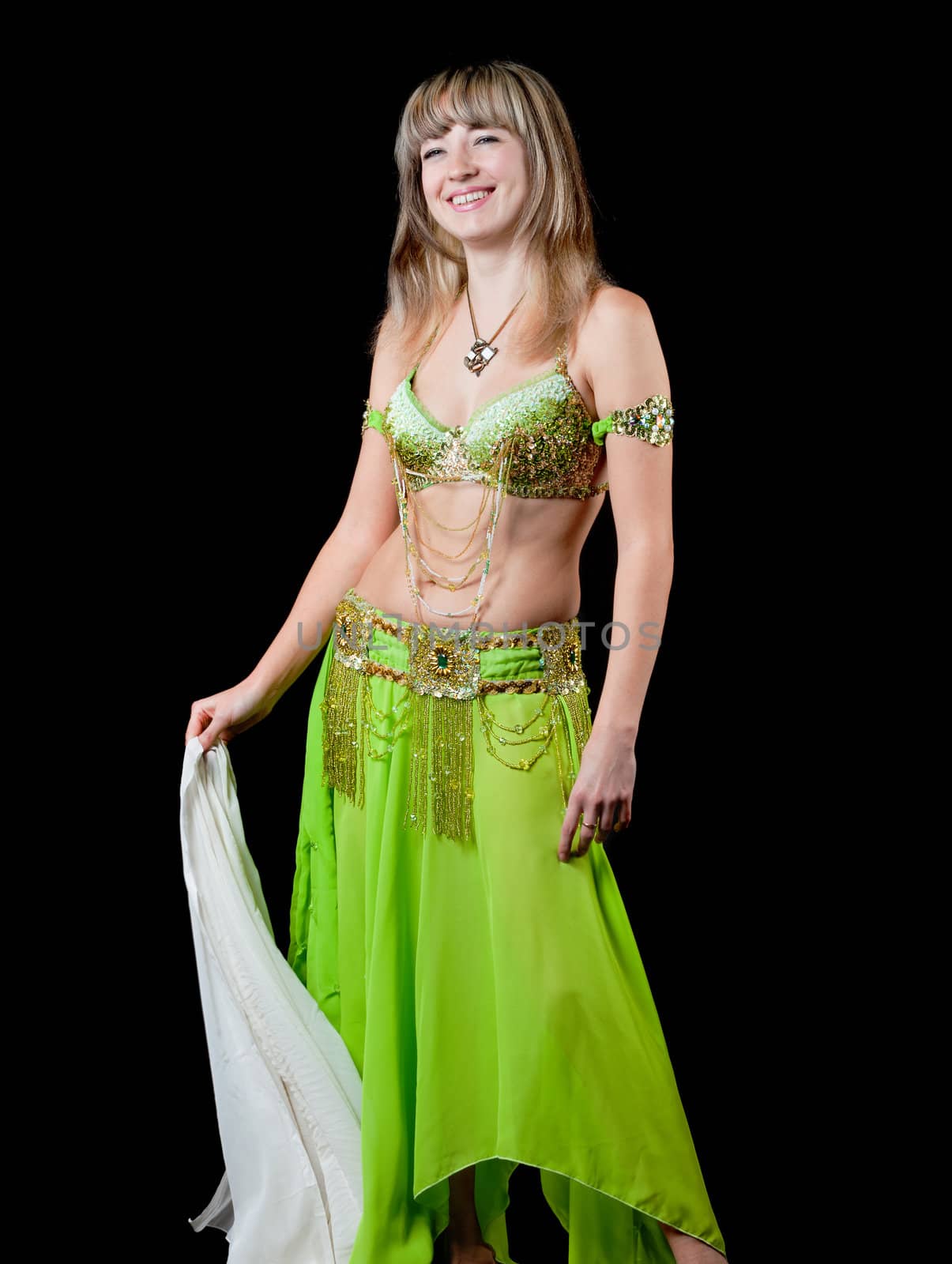 The woman in east dancing suit. Isolated on black background