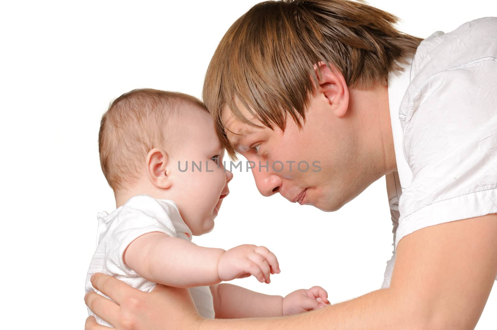 The father and the daughter. The child age of 8 months. It is isolated on a white background