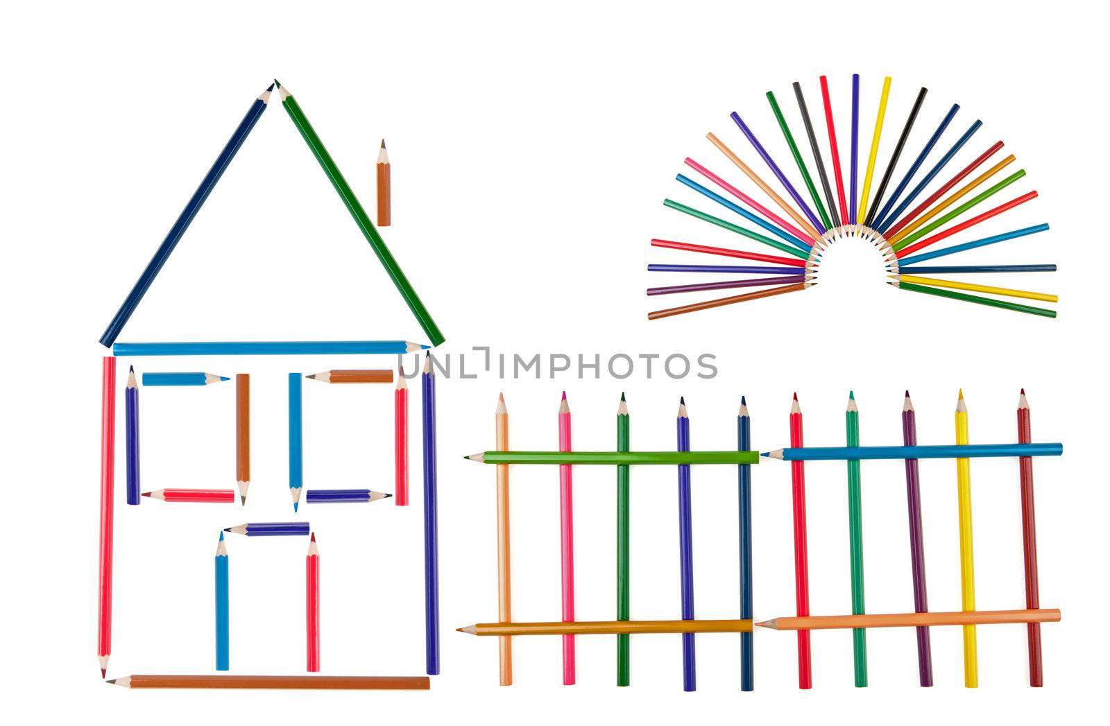 The house, fence and the sun from color pencils. It is isolated on a white background. Abstract concept